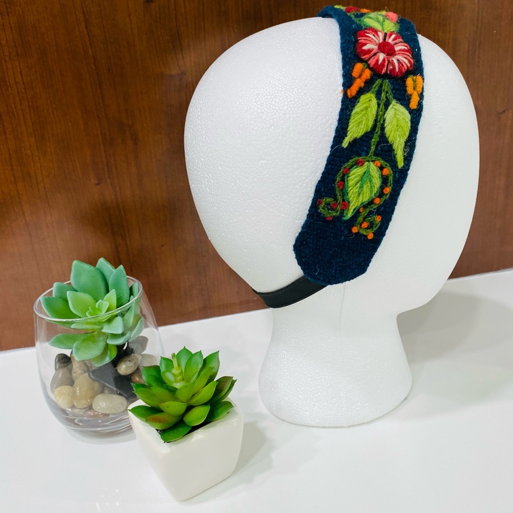 Headband handmade imported from Peru solid blue and embroidered flowers.
